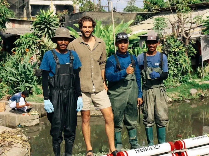 Tim with the Sungai Watch river-barrier crew in Bali